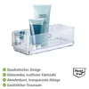 A clear acrylic shelf with two cosmetic bottles on a white background. Produktbild-Vorschau