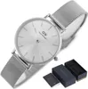 A Daniel Wellington watch with its box and manual. Produktbild-Vorschau