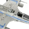 Close-up view of a Star Wars spaceship model, showing details of the cockpit and a droid. Náhled obrázku produktu