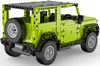 A toy replica of a green Suzuki Jimny vehicle, constructed from building blocks, shown from a rear-three-quarter angle. Voir les images du produit