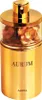 A gold perfume bottle with the brand name 'AURUM' and 'AJMAL' visible. Anteprima dell’immagine prodotto
