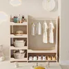 A children's wardrobe with shelves and a hanging rod, displaying clothes and accessories. Anteprima dell’immagine prodotto
