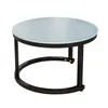 A round coffee table with a frosted glass top and a black metal frame. Náhľad obrázku produktu