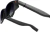 A pair of black smart glasses is shown from a high angle, with the arms extended. Anteprima dell’immagine prodotto