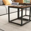 A close-up shot of a nesting coffee table set in a living room setting. Podgląd zdjęcia produktu