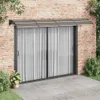 A door awning installed above a sliding glass door on a brick wall. Náhled obrázku produktu