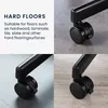 Collage showing black caster wheels on different hard floor surfaces, with text explaining their suitability for hard floors. Produktbild-Vorschau