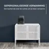 A compact heater sits on top of a white cabinet against a dark blue wall. Voir les images du produit