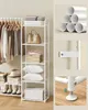 A collage showing different views and details of a white metal garment rack with shelves, displaying folded clothes, pillows, shoes, and handbags. Náhled obrázku produktu