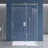 A modern shower cabin with a sliding door, installed in a bathroom with blue walls. Produktbild-Vorschau