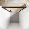 A top-down view of a modern shower enclosure with a black frame and glass doors, set against marble-tiled walls and a wooden floor with a rug. Voir les images du produit