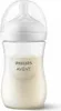 A clear studio shot of a baby bottle filled with milk. Podgląd zdjęcia produktu