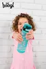 A young girl is holding a water bottle in front of her. Podgląd zdjęcia produktu