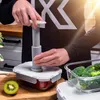 A person is using a vacuum pump to seal a glass food container. Anteprima dell’immagine prodotto