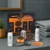 A men's grooming gift set is displayed on a bathroom counter. Náhled obrázku produktu