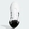 A top-down view of a white Adidas sneaker with black accents. Produktbild-Vorschau