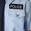 A close-up of a child's police costume shirt. Produktbild-Vorschau