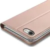 A close-up view of a rose gold flip case for a smartphone, showing the camera cutout and the stitching detail. Produktbild-Vorschau