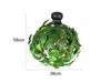 A green leaf-covered pendant light is shown against a white background with size indicators. Produktbild-Vorschau