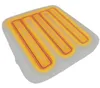 A heated seat cushion with glowing heating elements. Náhled obrázku produktu