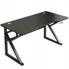 A black gaming desk with a carbon fiber pattern on a white background. Náhled obrázku produktu
