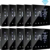 A collection of smart thermostats arranged in a grid. Náhled obrázku produktu