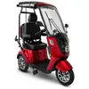 A red three-wheeled mobility scooter with a roof and windshield, shown from a three-quarter front angle on a white background. Produktbild-Vorschau