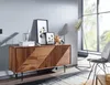 A modern living room with a wooden sideboard, artwork, and a floor lamp. Náhled obrázku produktu