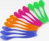 A diagonal arrangement of colorful plastic spoons. Produktbild-Vorschau