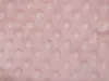 A close-up, top-down view of a pink blanket with a dimpled texture. Náhled obrázku produktu