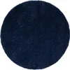 A round, dark blue rug is shown from a top-down perspective on a white background. Voir les images du produit