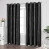 A pair of black curtains with silver wavy stripes hanging in front of a window. Produktbild-Vorschau