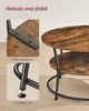 Close-up shots of a round coffee table with two tiers, highlighting its construction and features. Produktbild-Vorschau