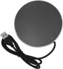 A top-down view of a black, circular USB-powered mug warmer with a silver rim, and a black USB cable attached. Podgląd zdjęcia produktu