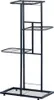 A black metal plant stand with four tiers. Náhled obrázku produktu