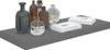 A shelf with decorative bottles and books. Produktbild-Vorschau