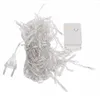 A tangled string of clear fairy lights with a white control box and a clear plug. Produktbild-Vorschau