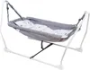 A baby hammock with a grey fabric and a white mattress with star patterns, set against a white background. Produktbild-Vorschau