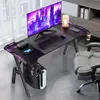 A gaming desk setup with a computer, monitor, keyboard, mouse, and chair in a room. Produktbild-Vorschau