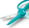 A close-up shot of teal-colored scissors with silver blades. Voir les images du produit