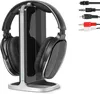 A pair of wireless headphones and their charging stand are displayed on a white background, with various audio cables shown to the right. Voir les images du produit