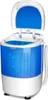 A compact, portable washing machine with a blue transparent drum and a white base and lid. Produktbild-Vorschau