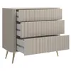 A light beige dresser with three drawers and gold metal legs, displayed against a white background. Produktbild-Vorschau