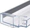 Close-up of a clear plastic refrigerator door shelf. Náhled obrázku produktu