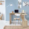 A home office setup with a desk, chair, and floor lamp. Produktbild-Vorschau