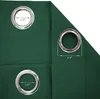 Close-up of grommets on a green curtain, with measurements indicated. Produktbild-Vorschau