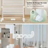 A collage showing a clothes drying rack with a close-up of its wheel locking mechanism and a detail of its hanging hooks. Produktbild-Vorschau