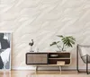 A living room scene featuring a credenza with decorative items and a chair. Produktbild-Vorschau