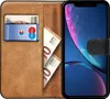 A book-style phone case with a phone, cards, and cash inside. Produktbild-Vorschau