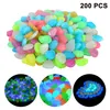 A pile of colorful, glowing pebbles. Produktbild-Vorschau